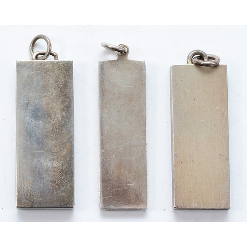 110 - Two silver ingot pendants, Birmingham 1977, with a silver ingot pendant, Sheffield 1977, 75g