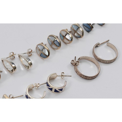 189 - Twelve pairs of 925 silver gemset earrings with scroll backs, 50g