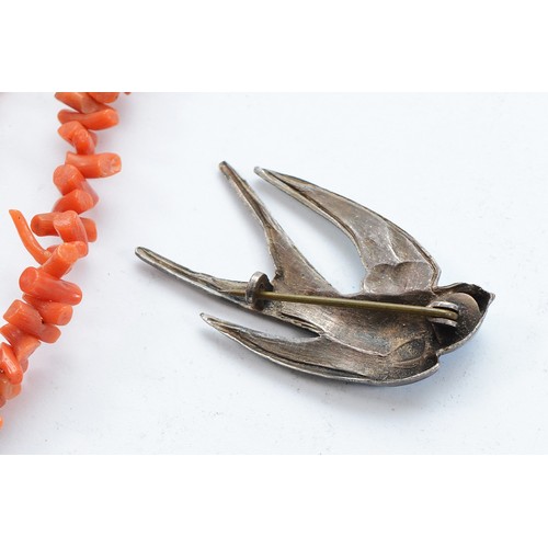 205 - A branch coral necklace, 50cm, a matching bracelet, 18cm and an enamel swallow brooch (3)