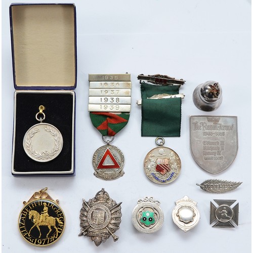 212 - Ten various silver medals and badges, together with a silver pill box, various dates, approximately ... 