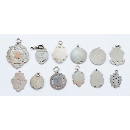 213 - Twelve various silver watch fobs and medals, various dates, 119gm