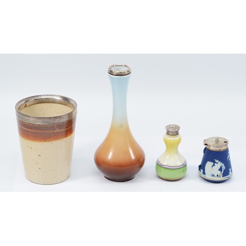 229 - A porcelain bud vase with painted landscape scene to the front, having silver collar, Chester 1913, ... 