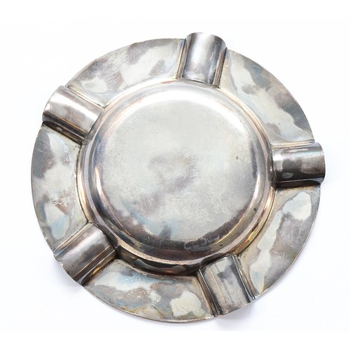 236 - A silver circular ashtray having five cigarette rests, Birmingham 1911, 84gm, 13cm.