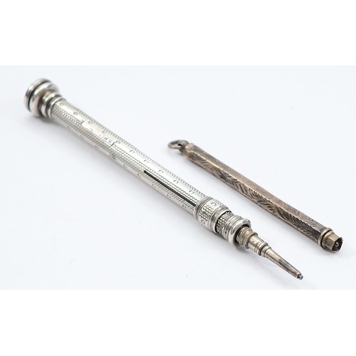 237 - A silver vesta case, Birmingham 1920, 18gm, together with an S. Mordan & Co slide action propelling ... 