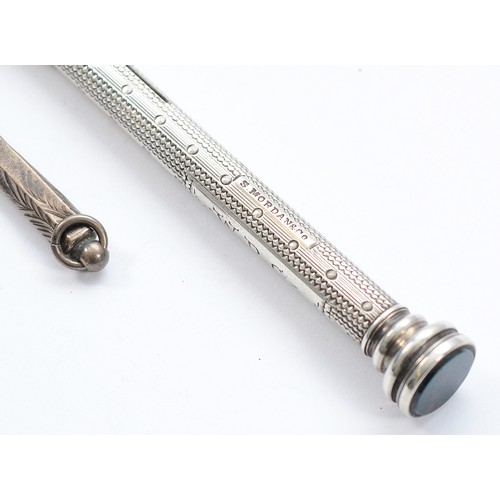 237 - A silver vesta case, Birmingham 1920, 18gm, together with an S. Mordan & Co slide action propelling ... 