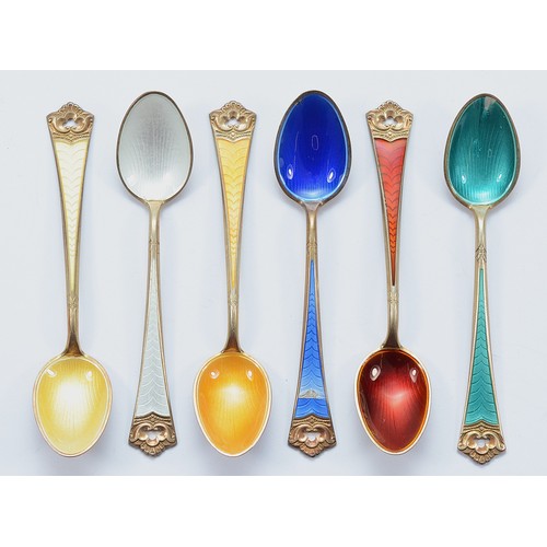 239 - A set of six Norwegian silver gilt and enamel coffee spoons, by David Anderson, 67gm.

condition - h... 
