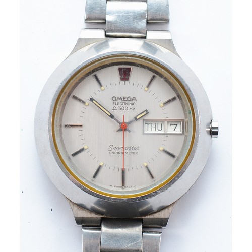 Omega Electronic F300Hz Seamaster Chronometer, a stainless steel day date quartz gentleman's wristwatch, cal 1260, twelve jewel movement, original crown and buckle, diameter 40mm, replacement battery not working, in need of new rubber seal, day and date adjust fine, second hand moves abnormally fast when adjusting time, slight dent to case at 1 o'clock.