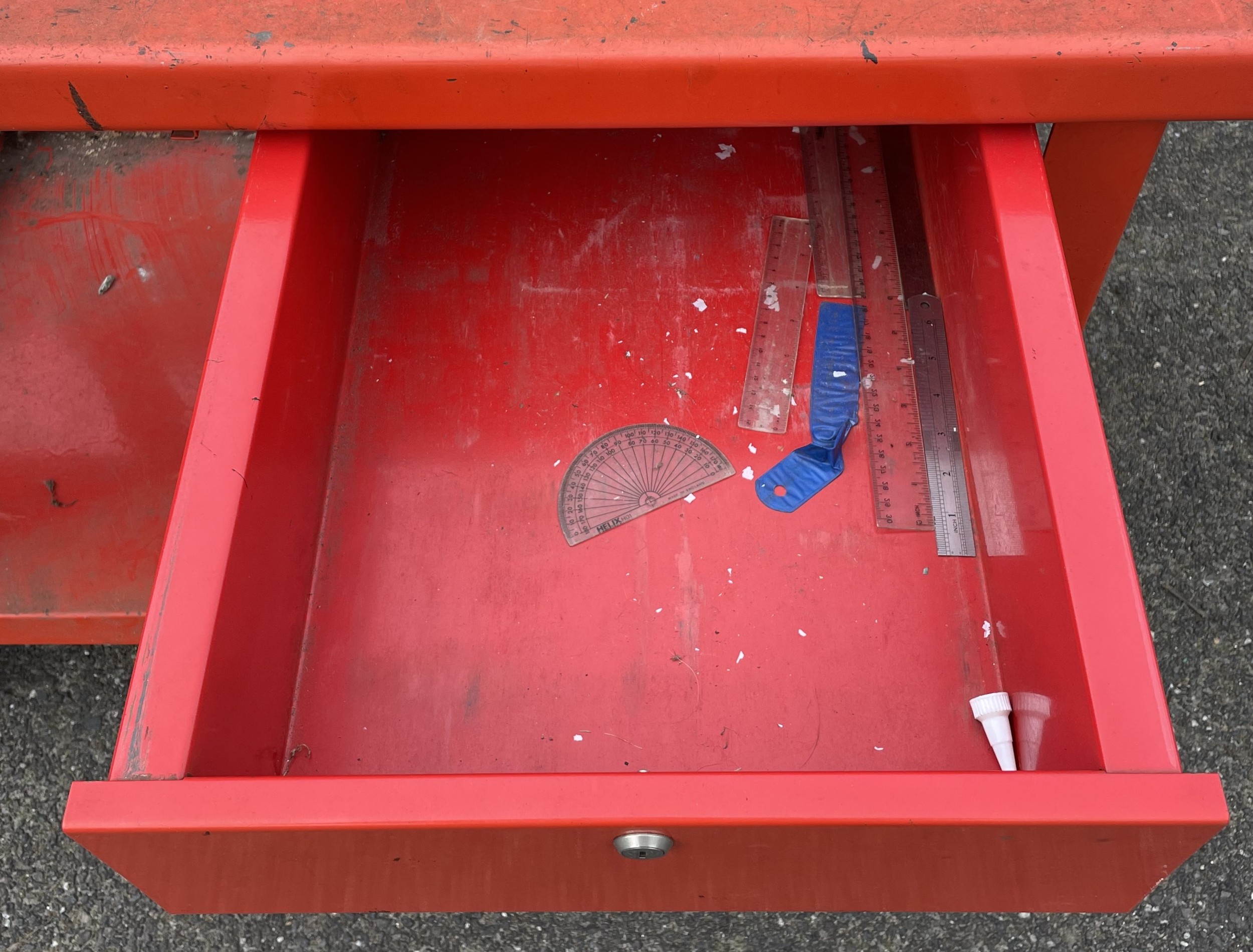 A steel engineers workbench with single drawer and lower shelf ...