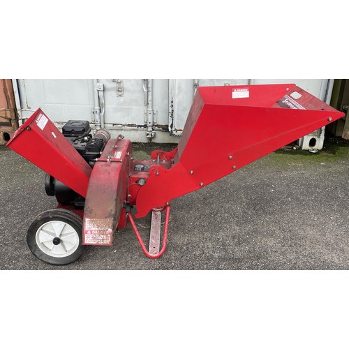 A MTD Wood Chipper/Shredder, model no. 241-645-611, powered by a Briggs & Stratton 5HP engine.