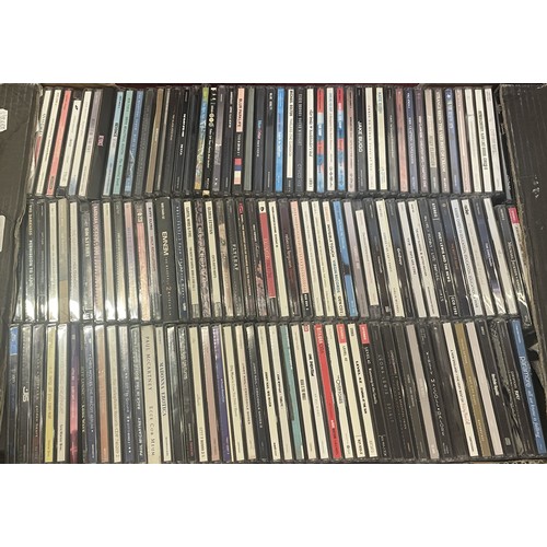 A collection of music CDS to include Frank Sinatra, Eminem, Foo ...
