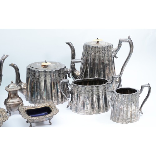 65 - A four piece silver tea set, compromising of a teapot, coffee pot, milk jug and twin handled sugar b... 