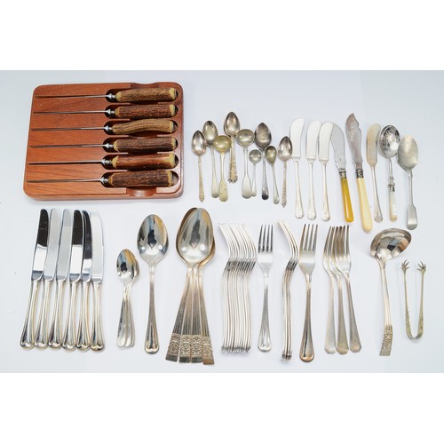 67 - A collection of silver plated cutlery to include a plated ladle, having pierced terminal, four plate... 