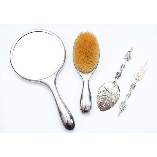 68 - A Dutch silver plated dressing table mirror, by Gero Zeist, 1927, with a matching hair brush, both w... 