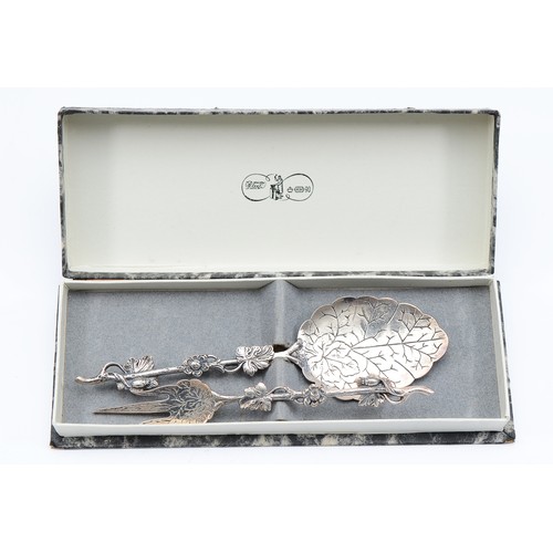 68 - A Dutch silver plated dressing table mirror, by Gero Zeist, 1927, with a matching hair brush, both w... 