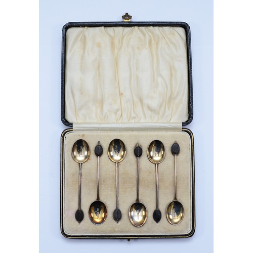 69 - A set of six silver gilt and enamel coffee spoons, Birmingham 1928, by William Suckling Ltd, 45gm, c... 