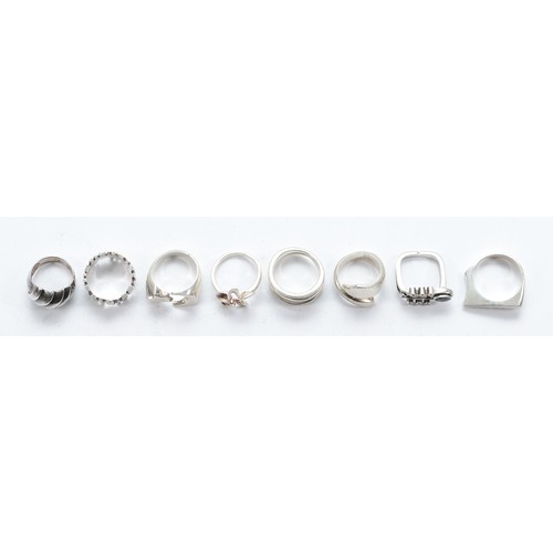 86 - Eight 925 silver rings, L-T, 61g