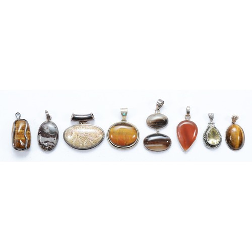 90 - Seven 925 silver gemset pendants, and an unmarked silver pendant, 87g