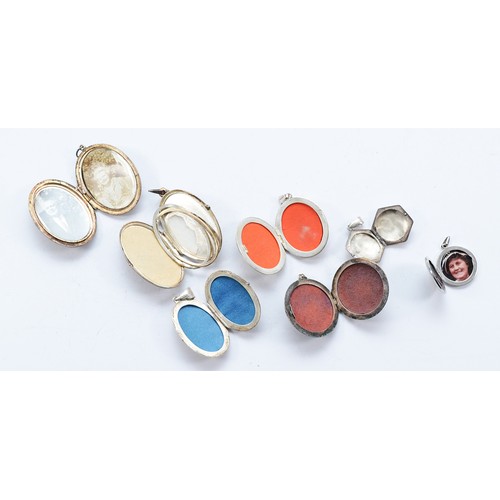 91 - Three silver locket pendants, Birmingham 1970-1975, a 925 silver locket pendant and three sterling s... 