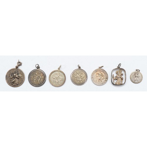 93 - Georg Jensen, a silver St Christopher pendant, a silver St Christopher pendant, Birmingham 1974, and... 