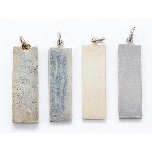 96 - Three silver ingot pendants, Sheffield 1977, and a silver ingot pendant, London 1977, 76g