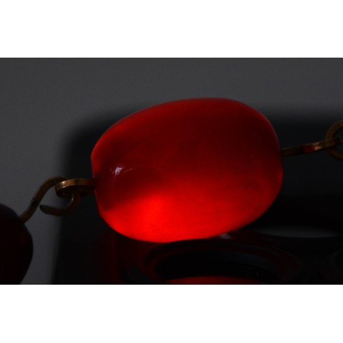 100 - A cherry Bakelite beaded necklace, largest bead 20mm, 46cm, 19g