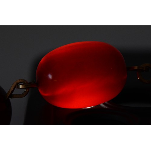 100 - A cherry Bakelite beaded necklace, largest bead 20mm, 46cm, 19g