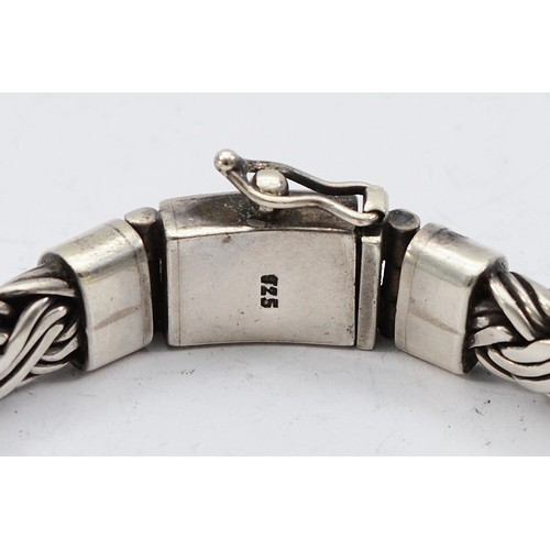 105 - A 925 silver plaited effect bracelet, 22cm,55g
