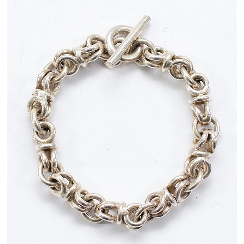 106 - A silver bracelet with T bar closure, Edinburgh 2005, 19cm, 43g