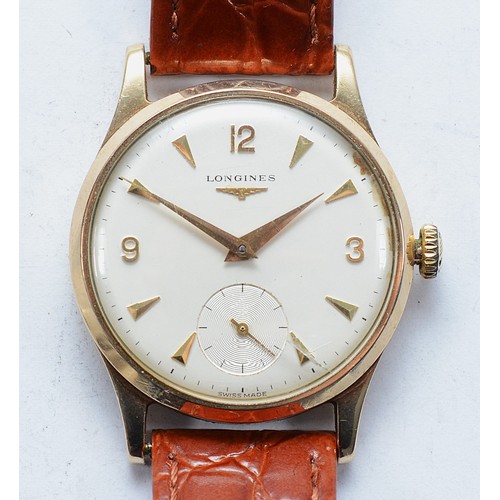 Longines, a 9ct gold manual wind gentleman's wristwatch, serial number 12974144, 17 jewel "30L" movement, case number 13322, cream dial with subsidiary second dial, original crown, with associated leather strap, diameter 33mm, working when catalogued, small scratch to crystal at 5 O'clock, other minor wear commensurate with age.