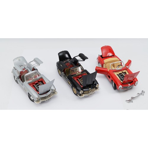 19 - Bburago, Mercedes Benz SL300, convertible, scale 1:8, in red, front bumper and off side head lamp gl... 