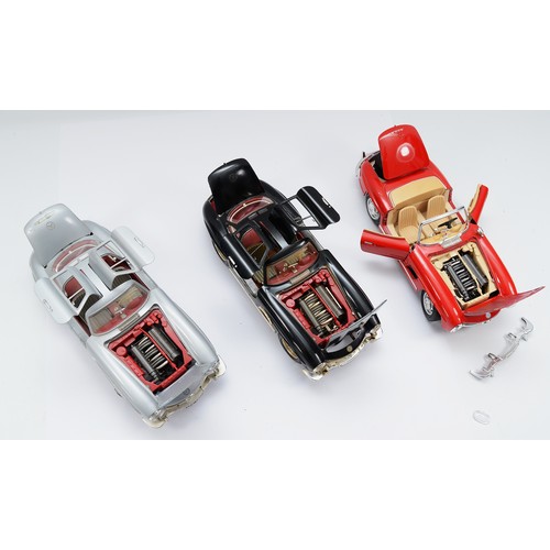 19 - Bburago, Mercedes Benz SL300, convertible, scale 1:8, in red, front bumper and off side head lamp gl... 