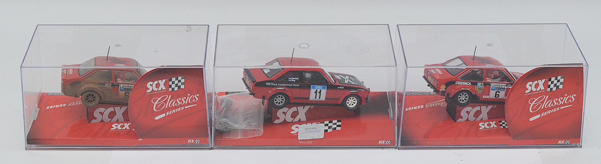 SCX Slot Car issues comprising, No 62800 Ford Escort MkII , No 64560 ...
