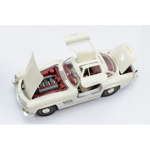 32 - Bburago, 1954 Mercedes Benz 300SL, scale 1:18, Maisto Mercedes Benz A Class, Hakinen #1, and another... 