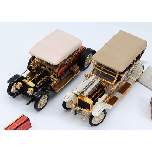36 - Franklin Mint model 1910 Rolls Royce Silver Ghost, in red, with picnic basket, together with a 1911 ... 