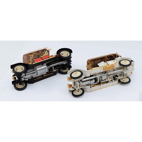36 - Franklin Mint model 1910 Rolls Royce Silver Ghost, in red, with picnic basket, together with a 1911 ... 