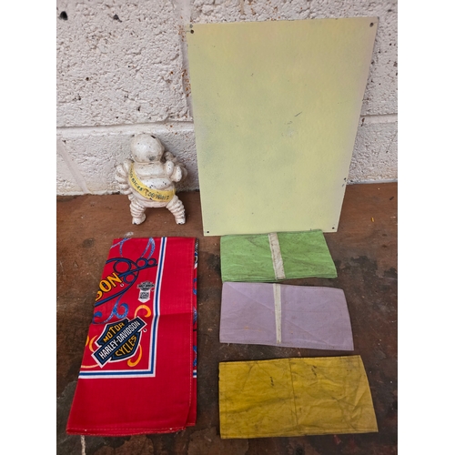 42 - A Reddex enamel Agency sign, 30 x 23cm, a period cast iron painted Michelin man, three B.R.D.C. armb... 