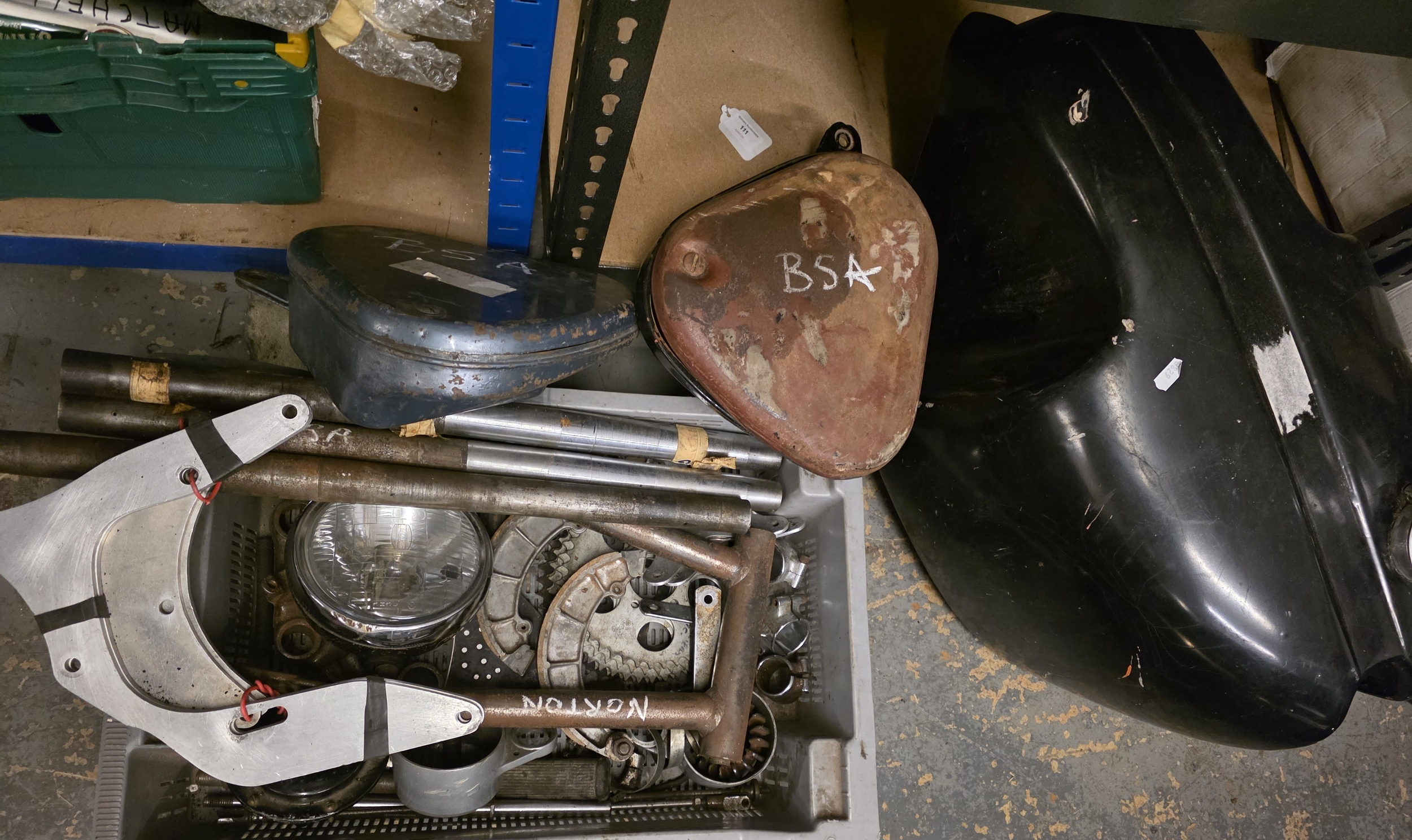 A collection of BSA and Triumph spares, including two tool boxes, and a ...