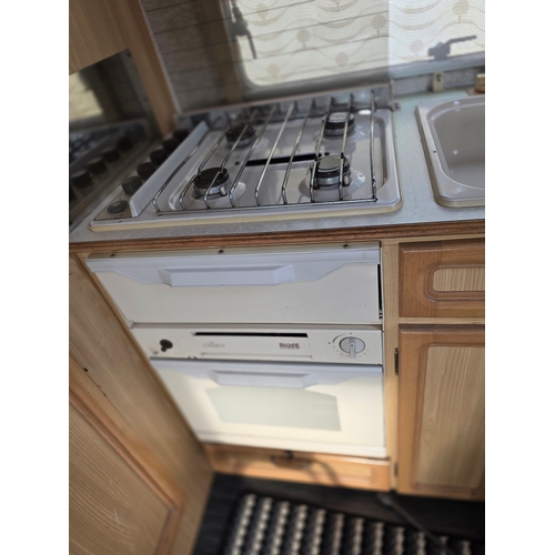 283 - c. mid 1990's Compass Rallye GTE 400/2 caravan, 2 berth, with gas heater, cooker, four burner hob, f... 