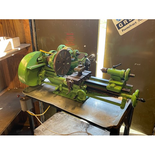 7 - A vintage Myford engineers lathe, manufactured in 1948, mounted on a fabricated steel bench, single ... 
