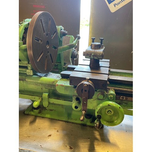7 - A vintage Myford engineers lathe, manufactured in 1948, mounted on a fabricated steel bench, single ... 