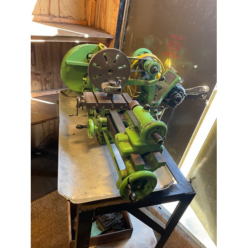 7 - A vintage Myford engineers lathe, manufactured in 1948, mounted on a fabricated steel bench, single ... 