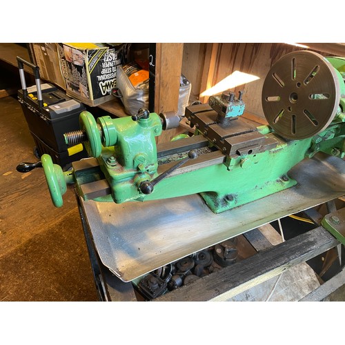 7 - A vintage Myford engineers lathe, manufactured in 1948, mounted on a fabricated steel bench, single ... 