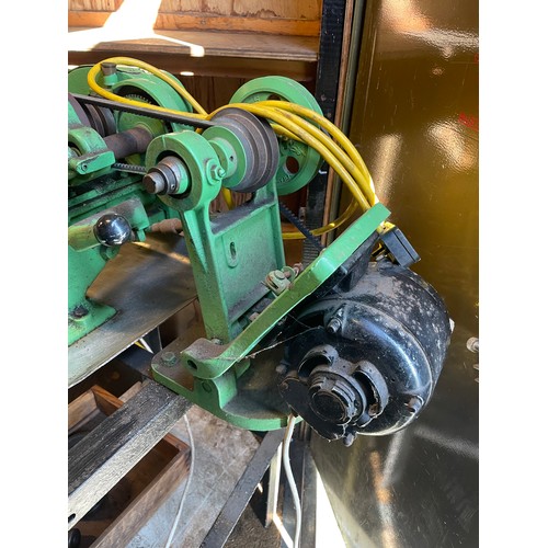7 - A vintage Myford engineers lathe, manufactured in 1948, mounted on a fabricated steel bench, single ... 