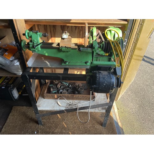 7 - A vintage Myford engineers lathe, manufactured in 1948, mounted on a fabricated steel bench, single ... 