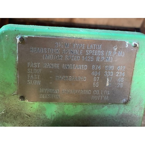7 - A vintage Myford engineers lathe, manufactured in 1948, mounted on a fabricated steel bench, single ... 