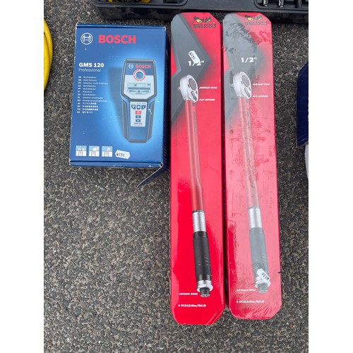 12 - A collection of tools to include a Stanley backpack, a Bosch GMS120, an Irwin GLM hand bending machi... 