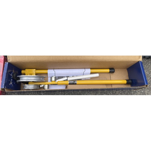 12 - A collection of tools to include a Stanley backpack, a Bosch GMS120, an Irwin GLM hand bending machi... 