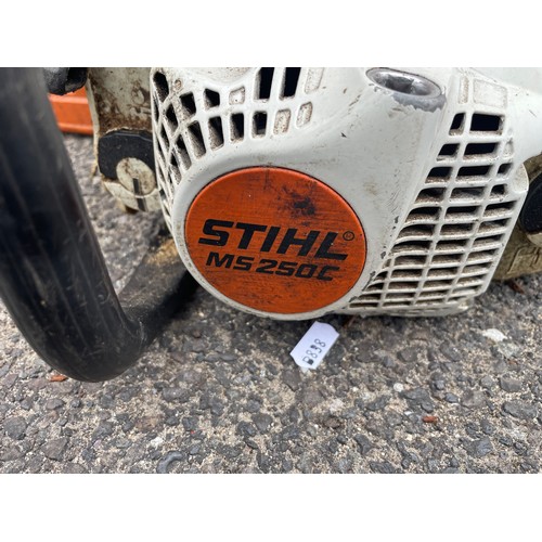 14 - A Titan chainsaw TTL632CHN, a Stihl MS250C chainsaw (with snapped pull cord) and Stihl face guard. (... 
