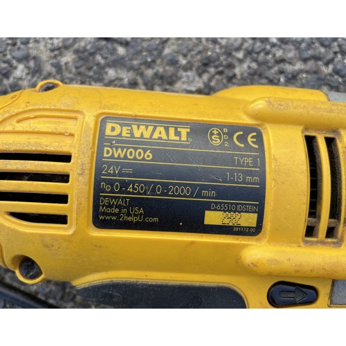 16 - A large collection of tools to include a Makita grinder 9069, a Titan 18V combi drill, a Dewalt Dril... 