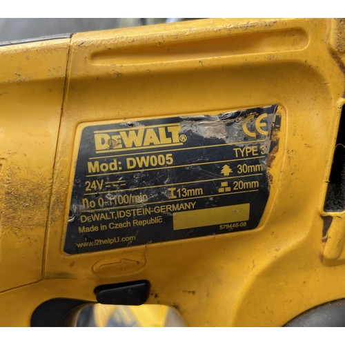 16 - A large collection of tools to include a Makita grinder 9069, a Titan 18V combi drill, a Dewalt Dril... 